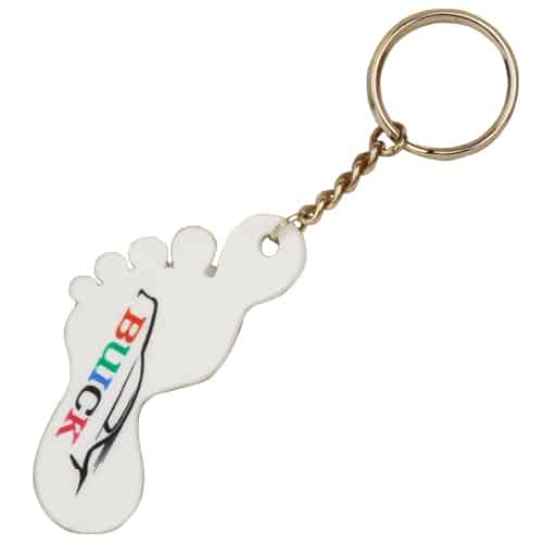 Personalised rubber keyring in the shape of a foot with a 5 colour printed logo on the front.