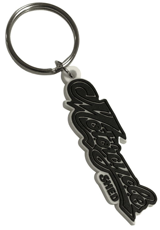 Motorcycle retailer custom rubber keyring with 1 colour embossed logo in black.