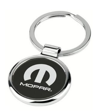 Circle shaped custom metal keyring with a very clear printed logo.