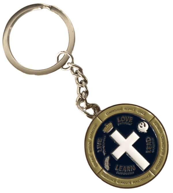 Circular custom metal keyring with embossed logo. These were given to college students.