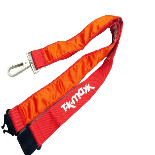 Red polyester lanyard with a satin ribbon stiched over the top. It features a metal clip and safety buckle.
