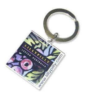 Copper keyring with high resolution printed logo, and clear gloss protected layer applied for protection.
