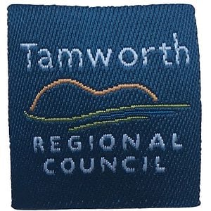 A detailed custom woven patch for the Tamworth Regional Council, showing intricate text and logos.