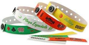 Custom plastic event wristbands showcasing branding like 'Playa Española VIP' & 'Gas Monkey Energy', serial numbers, and tear-off stubs (e.g., 'Casino Royal'). Ideal for secure access, VIPs & promotions. Get your custom design & quote!