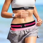 Lady jogging with womens sports waist bag.