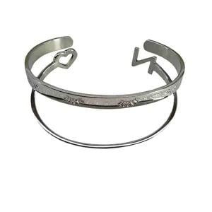 A custom metal bracelet with a brushed finish, contoured into a unique, custom shape.