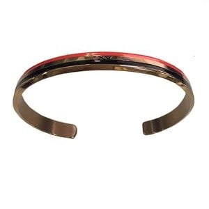 A custom stainless steel bracelet with an engraved logo and a decorative red and black line finish.
