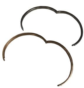 A slimline stainless steel bracelet that opens and closes with small, thin hinges.