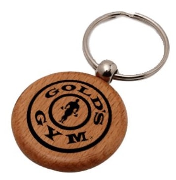 Promotional circular wooden keyring for a gym company wikth a sharp looking logo printed on the front.