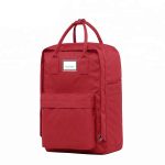 Red casual laptop backpack showing the front view.