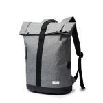 Grey travel waterproof school backpack. Front view/