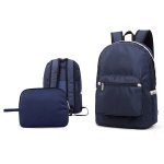 Front view of a dark blue foldable travel backpack.