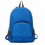 Front view of a blue lightweight foldable backpack.