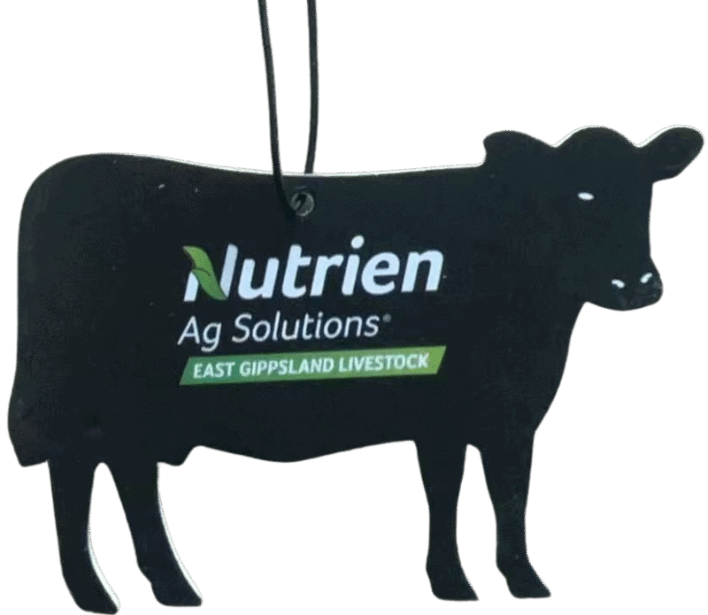 Black custom air freshener in the shape of a cow or steer, featuring the 'Nutrien Ag Solutions' logo in white and green, with 'EAST GIPPSLAND LIVESTOCK' printed below. The freshener has a black hanging string.