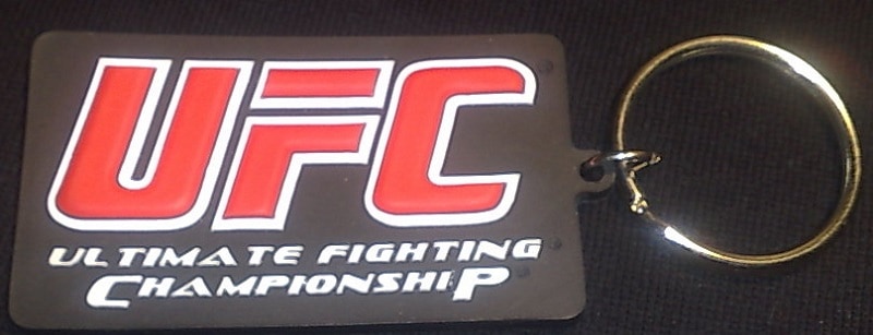 UFC logo in red on a rectangular custom rubber keyring.