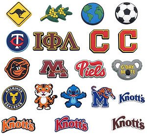 A vibrant collection of custom PVC shoe charms and soft rubber clog badges, showing various die-cut shapes, logos, and mascots available for bulk orders in Australia and beyond.