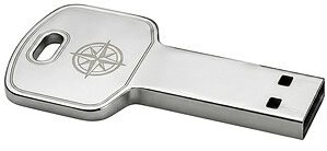 A stainless steel key-shaped USB drive with a laser-etched compass logo, perfect for real estate handovers and automotive gifts.