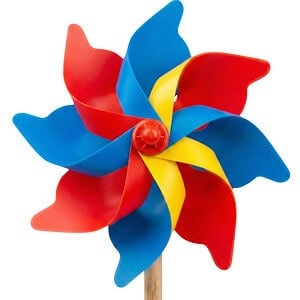 A vibrant multi-coloured custom plastic windmill spinning on a wooden stick, showing dynamic movement perfect for outdoor promotions.
