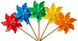 A fan arrangement of 5 colourful plastic windmills in red, blue, green, yellow, and orange, demonstrating bulk wholesale variety.