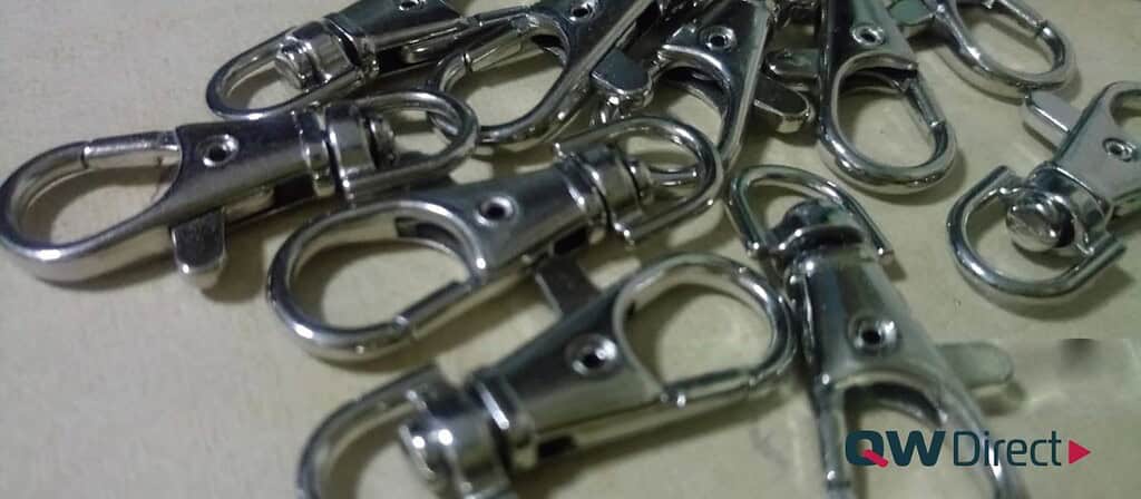 Close up of heavy duty metal lobster clasp and chain on custom promotional keyrings Australia