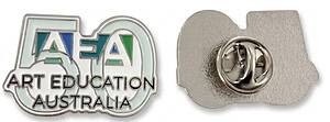A professional custom-shaped enamel anniversary badge for Art Education Australia, celebrating 50 years with a multi-coloured logo design.