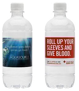 Examples of 600ml personalised bottled water for the Red Cross Blood Service and Biotherm, showcasing high-contrast full-colour labels.